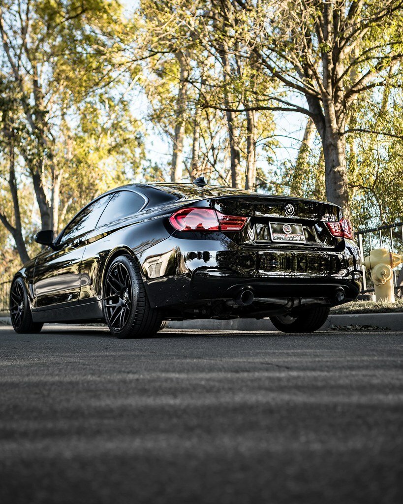 black bmw with black powder coated rims