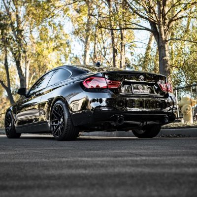 black bmw with black powder coated rims